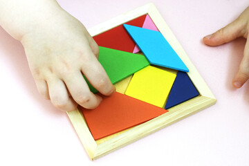 Tangram puzzle illustrating visual reasoning and problem-solving skills.